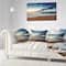 Designart - Sunrise and Glowing Waves in Ocean - Seascape Canvas Art Print